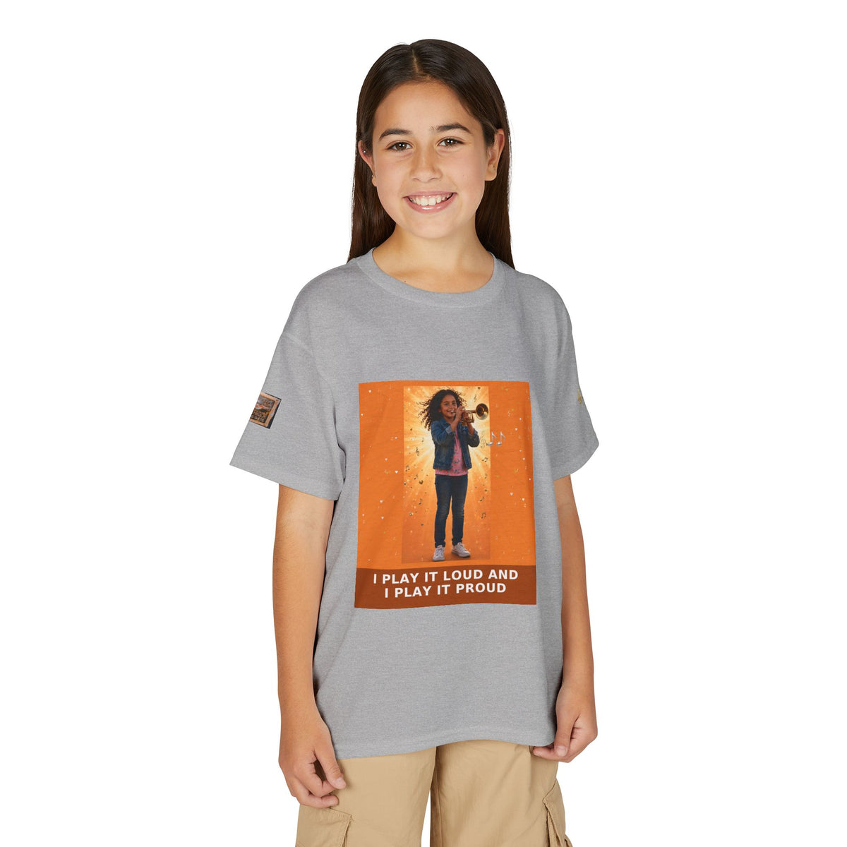 I Play It Loud and I Play It Proud — Latina Girl Trumpet Pre-Teen Musician Tee (Sunset Orange)