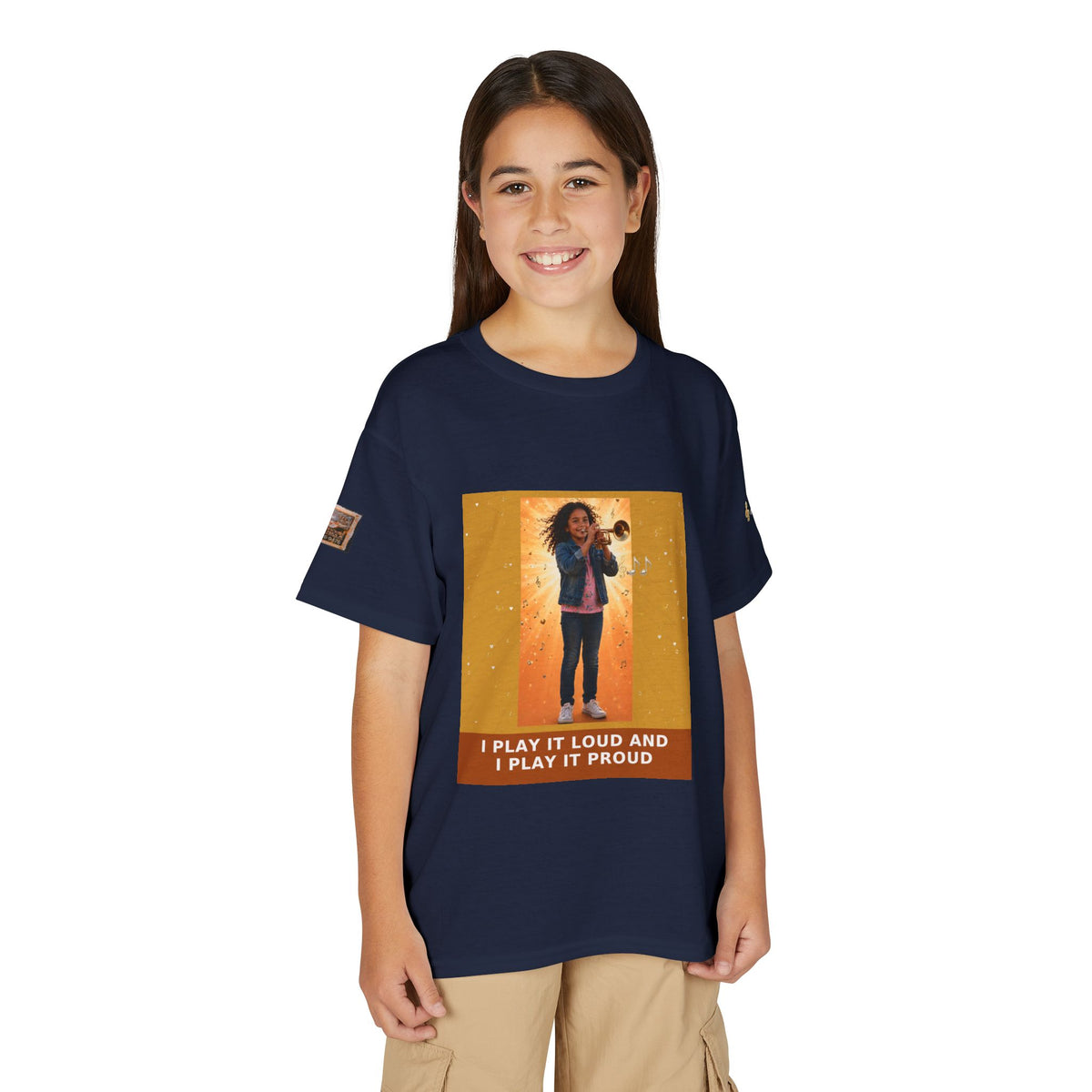 I Play It Loud and I Play It Proud — Latina Girl Trumpet Pre-Teen Musician Tee (Golden Amber)